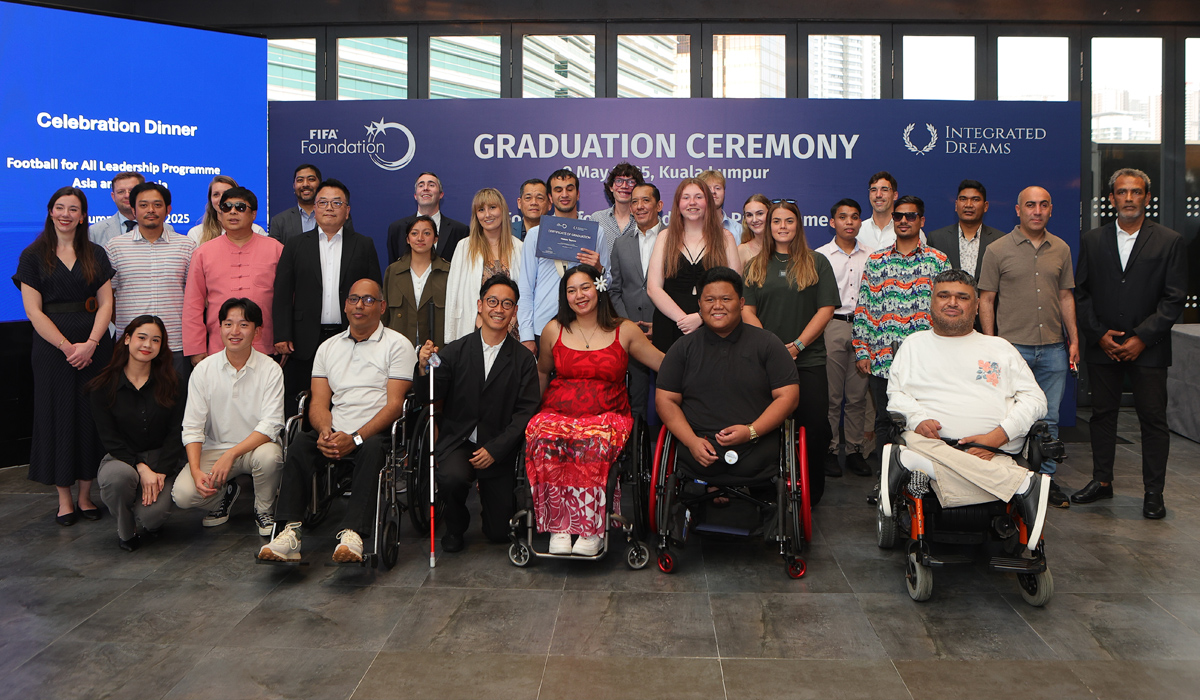 Football For All Leadership Programme 2018 alumni holding their Diplomas at the graduation ceremony